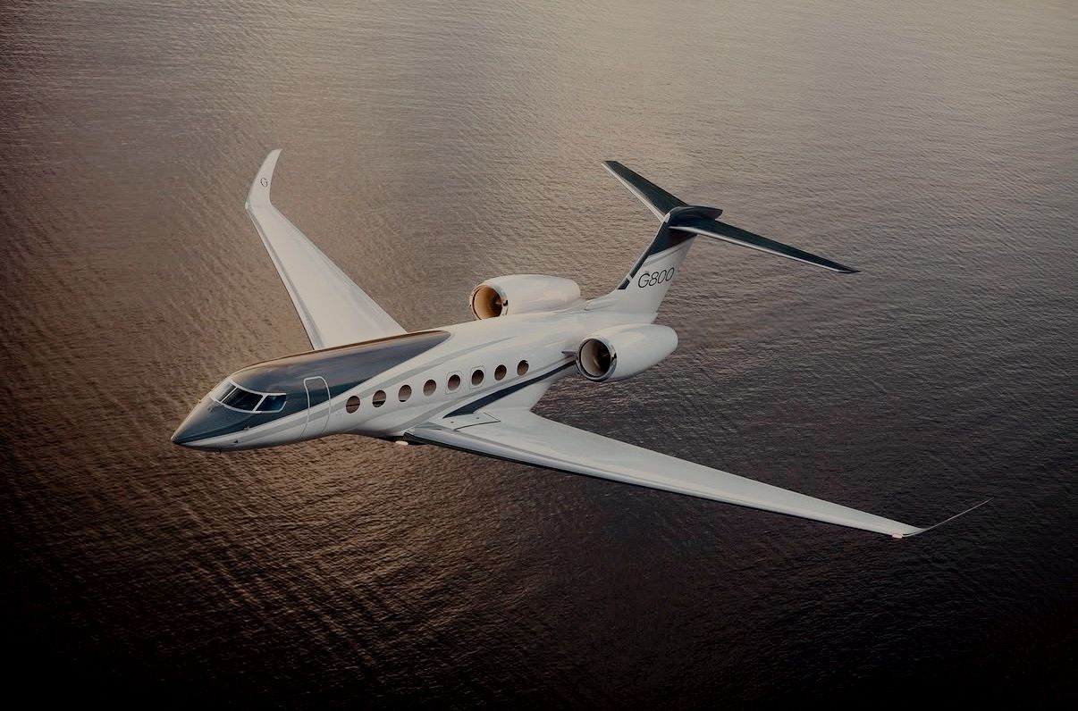 Corporate membership concierge service card with luxury travel scene