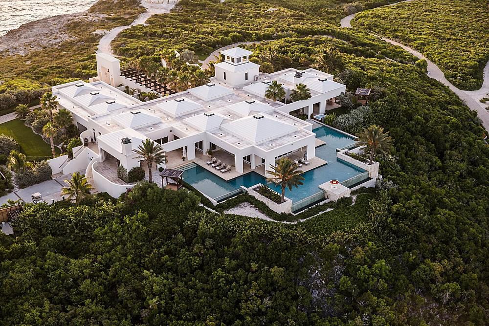 Aerial view of a private estate prepared for high-standard destination arrival